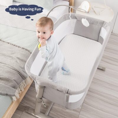 Baby bassinet bedside sleeper with 9 adjustable heights & music Box